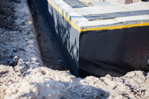 Professional Emergency Waterproofing technician working in Theresa, WI
